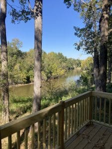 | two creeks crossing resort Photo of rocky creek from the back porch of a cabin